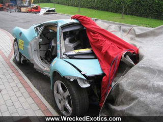 Illustration for article titled Wrecked Ferrari 458 Italias Hide Shame Under Tarps